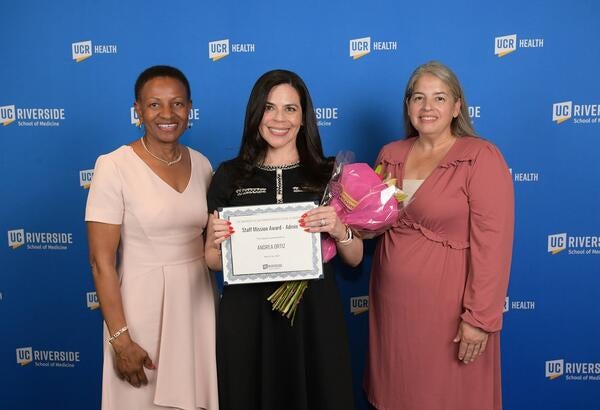 Dean Deas,  Andrea Ortiz, and Carie Smith