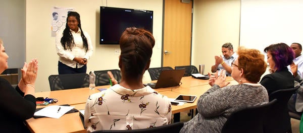 woman speaking to group